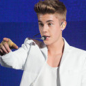 A Justin Bieber fan invaded the stage in Dubai to get a hug off Justin!