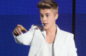 A Justin Bieber fan invaded the stage in Dubai to get a hug off Justin!