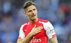 Olivier Giroud says Arsenal have the players and team spirit to be serious contenders next season.