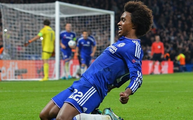 Chelsea's Brazilian midfielder Willian celebrates after scoring from a free kick during a UEFA Chamions league group stage football match between Chelsea and Dynamo Kiev at Stamford Bridge stadium in west London on November 4, 2015. AFP PHOTO / GLYN KIRKGLYN KIRK/AFP/Getty Images