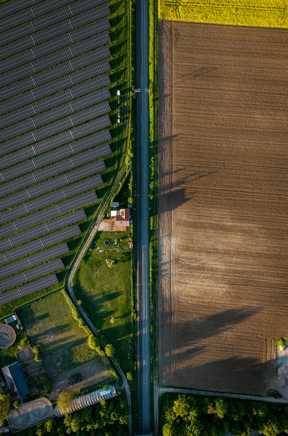 An aerial view of a solar farm in the countryside