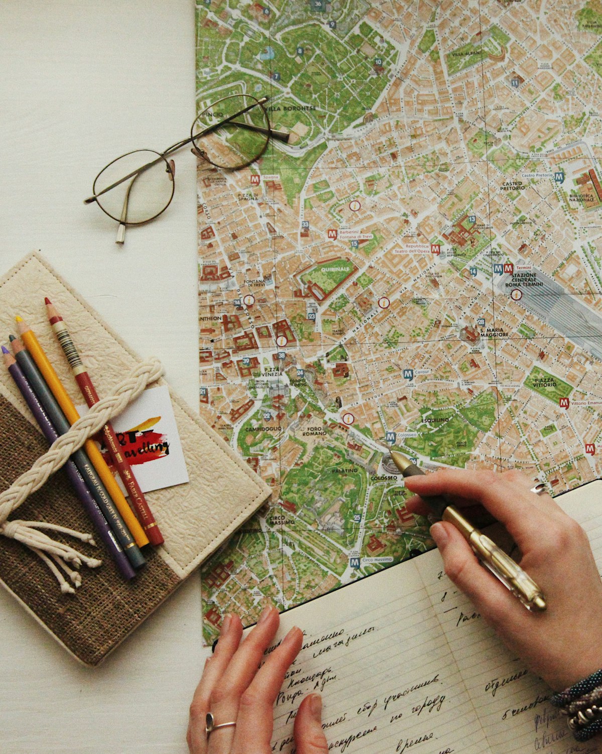 Someone drawing on a map of a neighbourhood