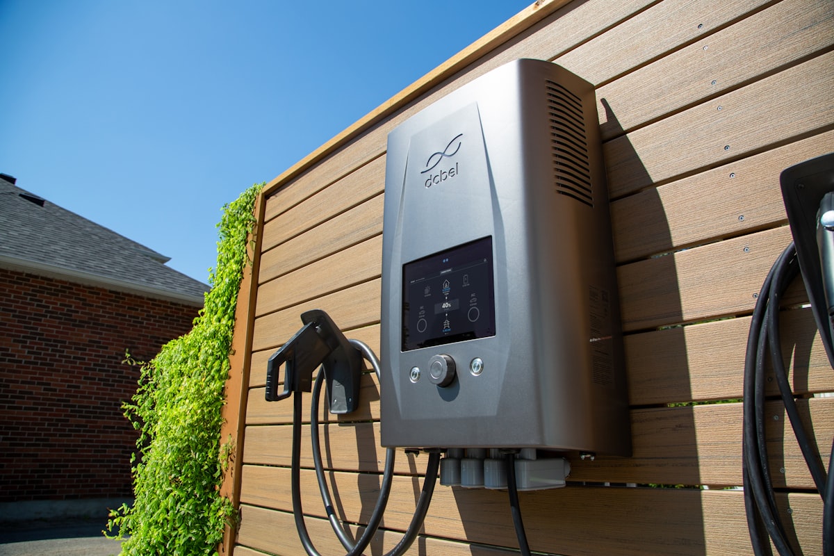 An electric car charger mounted on a wall