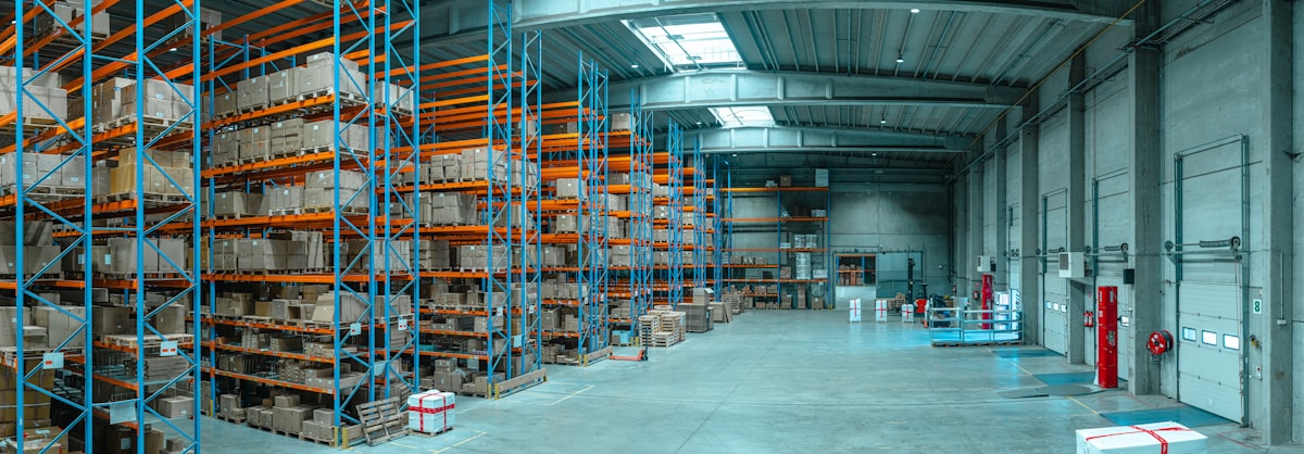 Tall shelves inside a warehouse