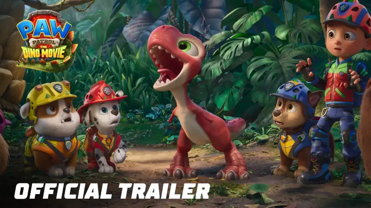 The PAW Patrol pups meeting a dinosaur in the trailer for PAW Patrol: The Dino Movie